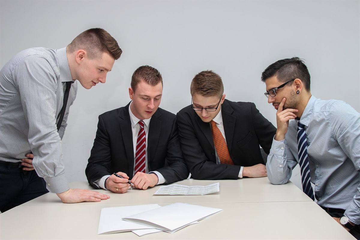 Business owners in a meeting reviewing documents